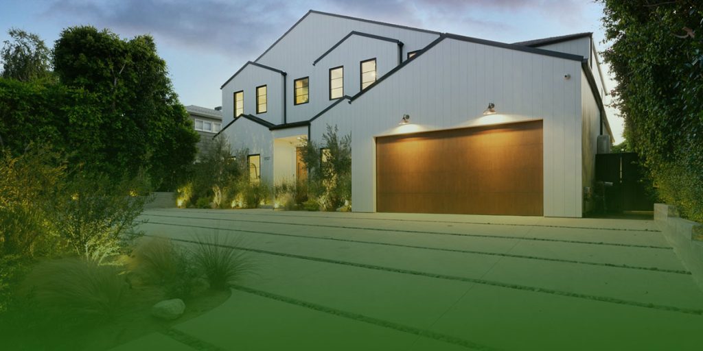 Faux wood garage doors on house